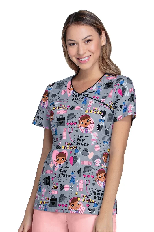 Cherokee Tooniforms Women's Mock Wrap Toy Fixer Print Scrub Top XXX-Large Print